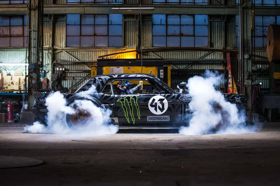 Drifting Racecarin Warehouse Burnout Wallpaper