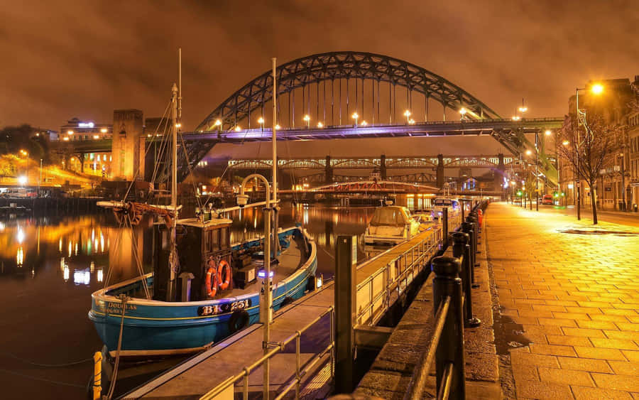 Dusk Falls Over The Newcastle Upon Tyne River Bridges Wallpaper