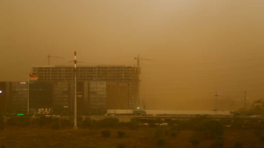 Dust_ Storm_ Over_ City_ Construction_ Site Wallpaper