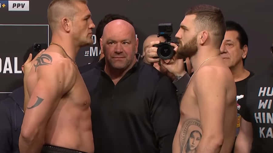 Dustin Jacoby Face-off With Michal Oleksiejczuk Wallpaper