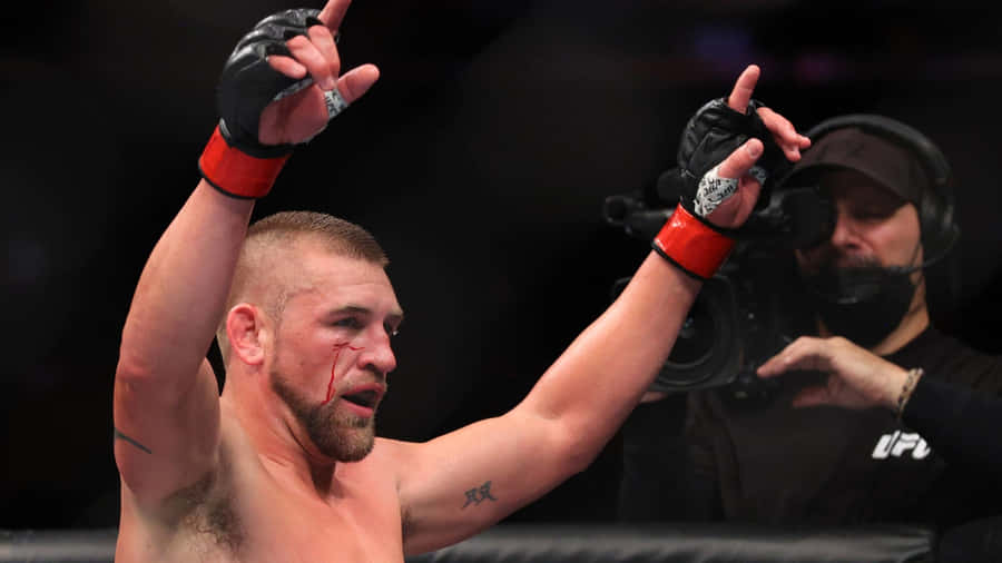 Dustin Jacoby Pointing Fingers Up Wallpaper