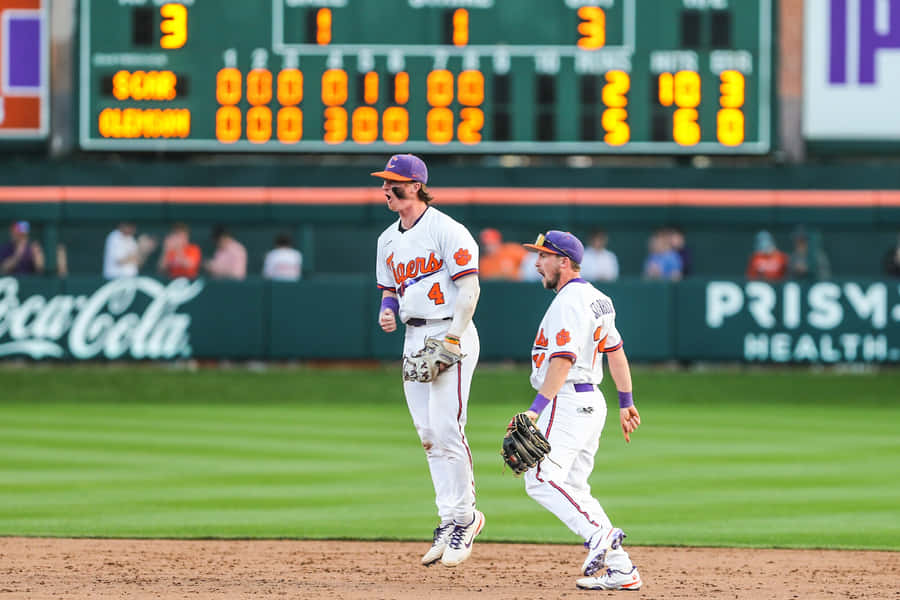 Dynamic College Baseball Game Moment Wallpaper