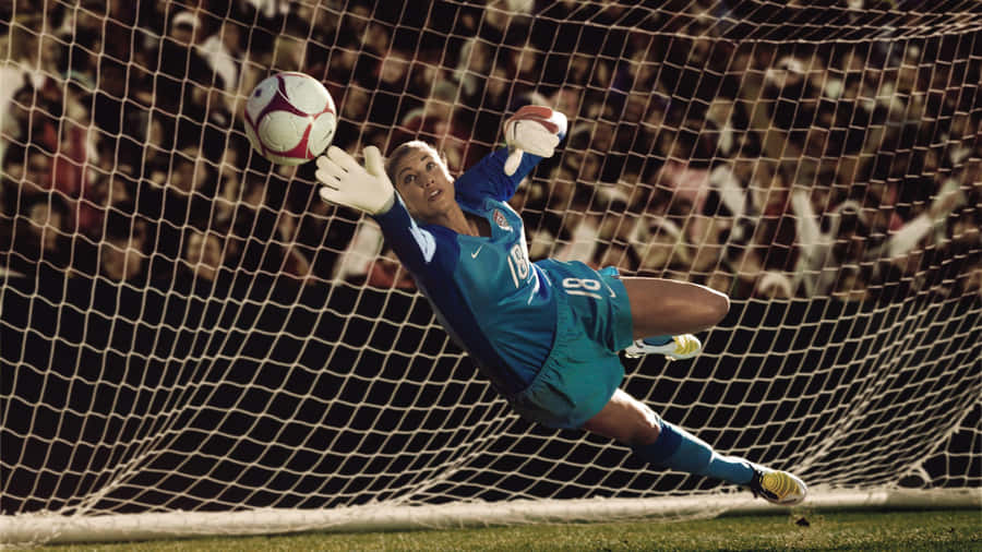 Dynamic Goalkeeper In Action Wallpaper