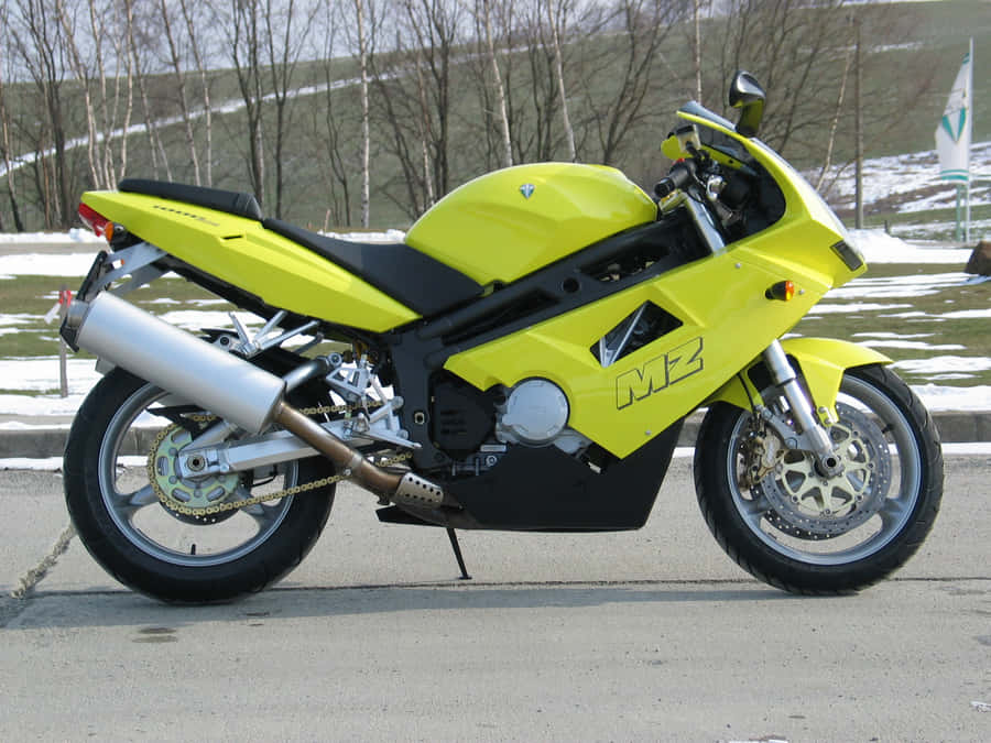 Dynamic Mz Motorcycle On Open Road Wallpaper