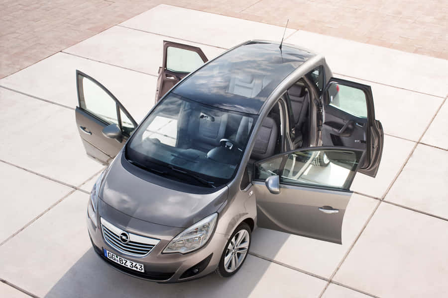 Dynamic Opel Meriva On Road Wallpaper