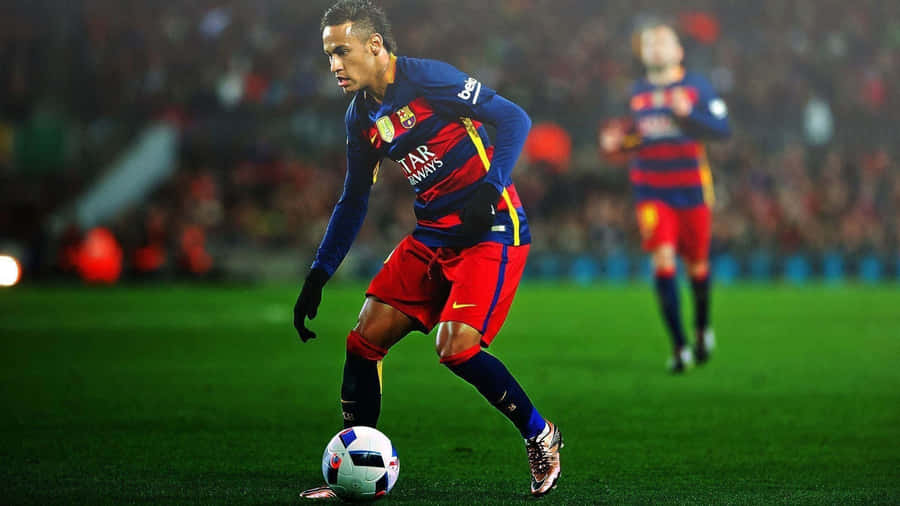 Dynamic Soccer Player Perfecting Dribbling Skills Wallpaper