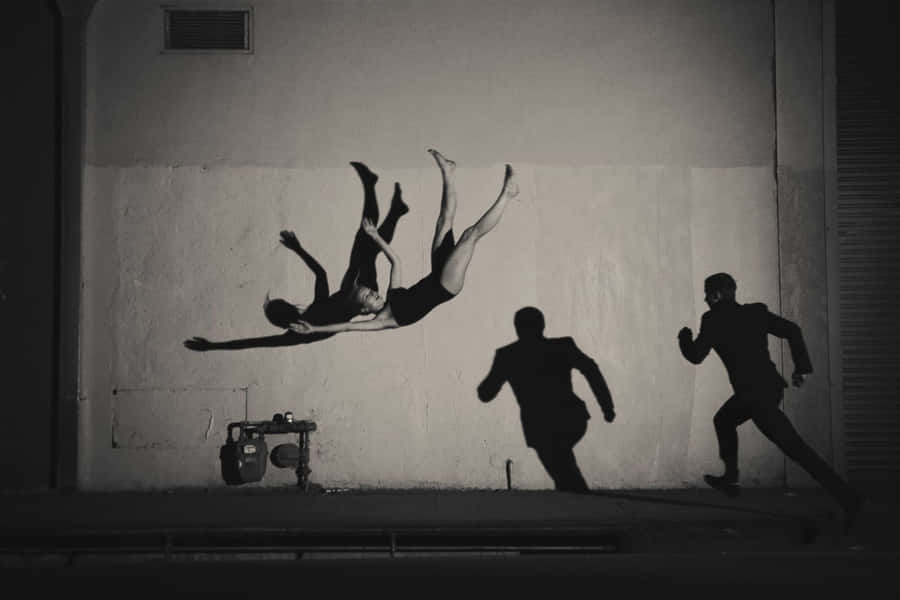 Dynamic Urban Acrobatics Wallpaper