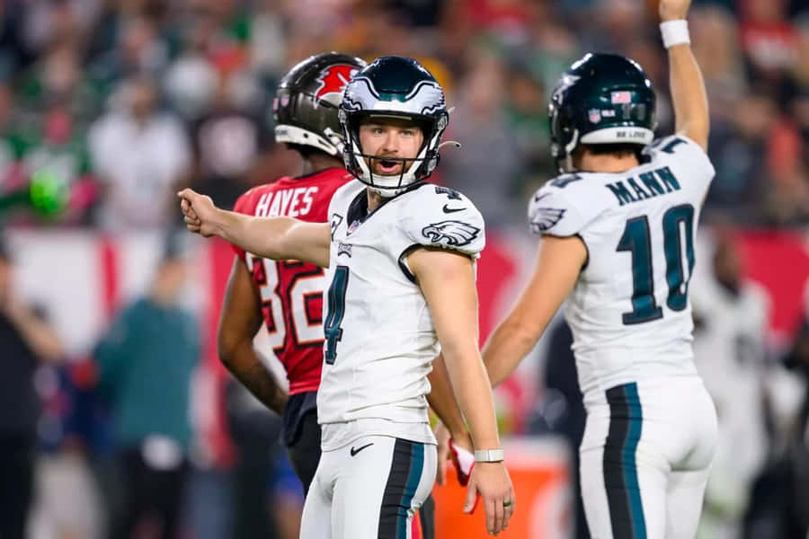 Eagles Kicker Jake Elliott Celebratingon Field Wallpaper