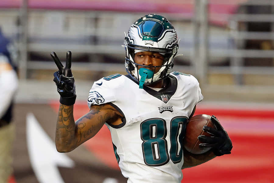 Eagles Player Quez Watkins Victory Sign Wallpaper
