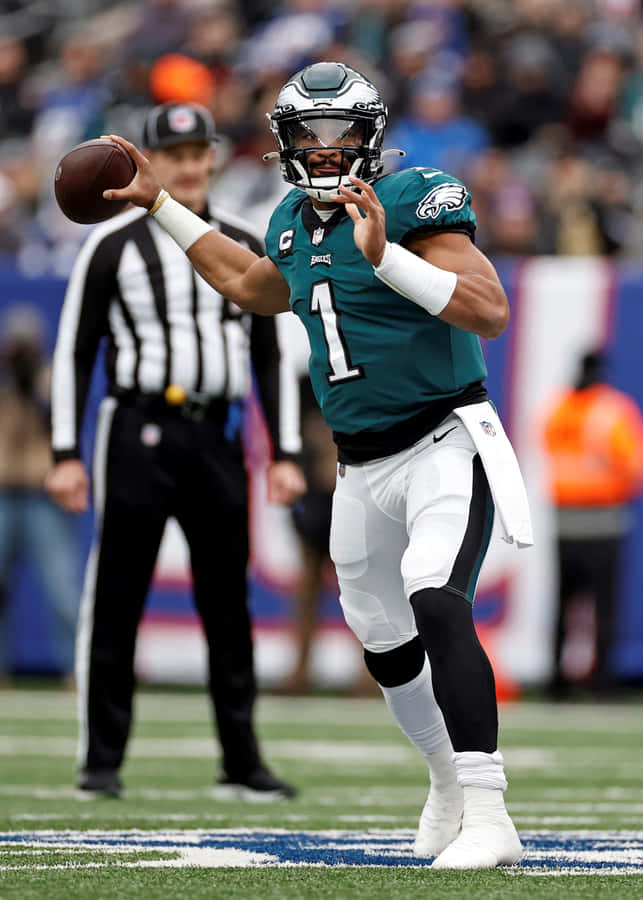 Eagles Quarterback Jalen Hurts In Action Wallpaper