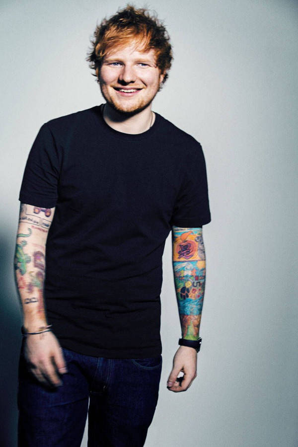 Ed Sheeran Beaming With Joy Wallpaper