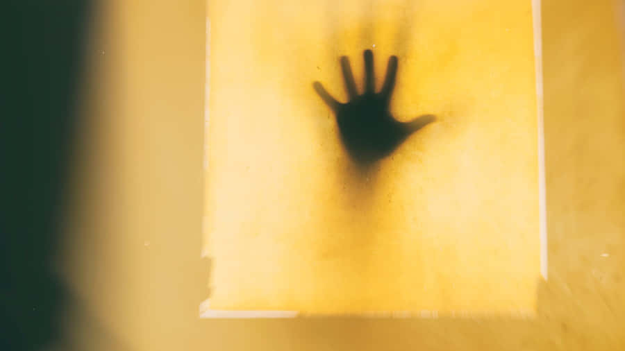 Eerie_ Shadow_ Hand_ Horror_ Aesthetic.jpg Wallpaper