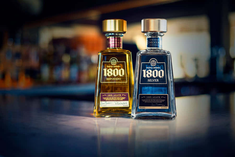 Elegant 1800 Tequila Silver And Reposado Bottles Wallpaper