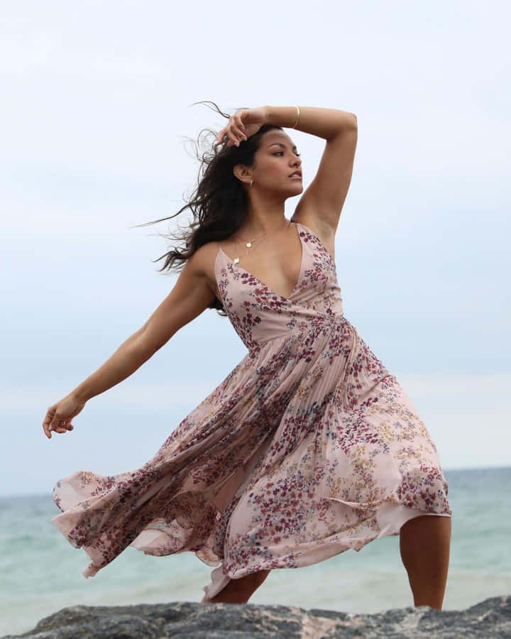 Elegant Beachside Pose Wallpaper