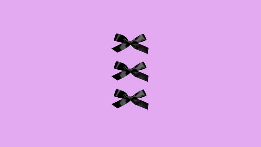 Elegant Black Bow Trio Wallpaper