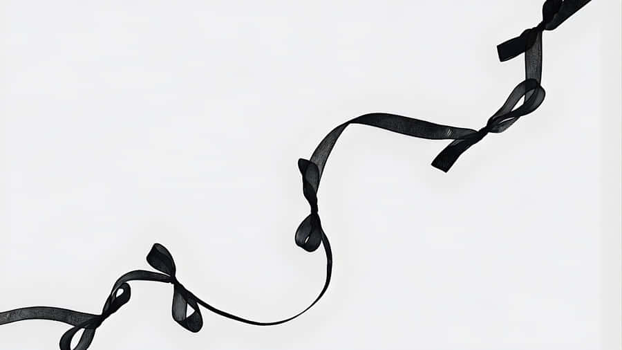 Elegant Black Ribbon Bow Wallpaper