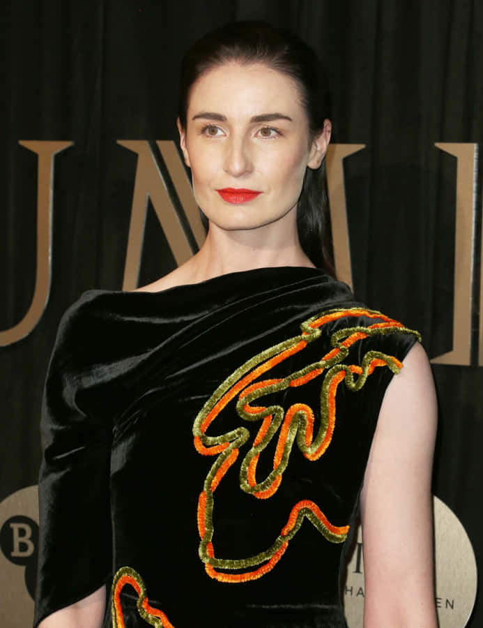 Elegant Black Velvet Dress Event Wallpaper