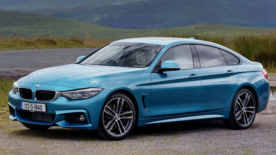 Elegant Bmw 4 Series Cruising The Streets Wallpaper