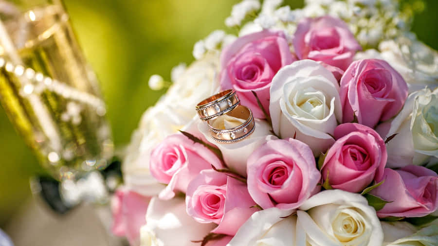 Elegant Bridal Bouquet In Bride's Hands Wallpaper