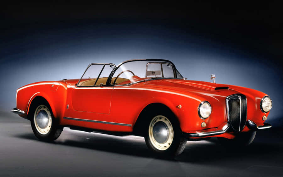 Elegant Classic - The Lancia Aurelia In Pristine Condition Wallpaper