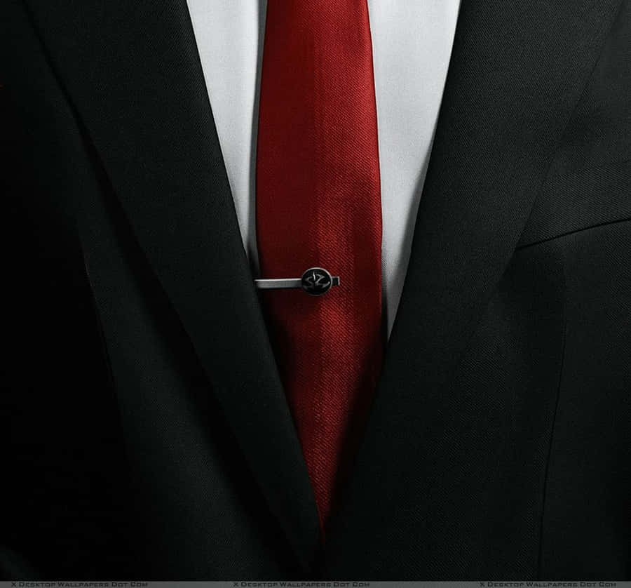 Elegant Man Wearing Luxurious Red Tie Wallpaper