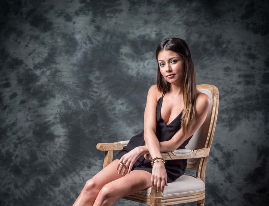 Elegant Portrait Woman Classic Chair Wallpaper