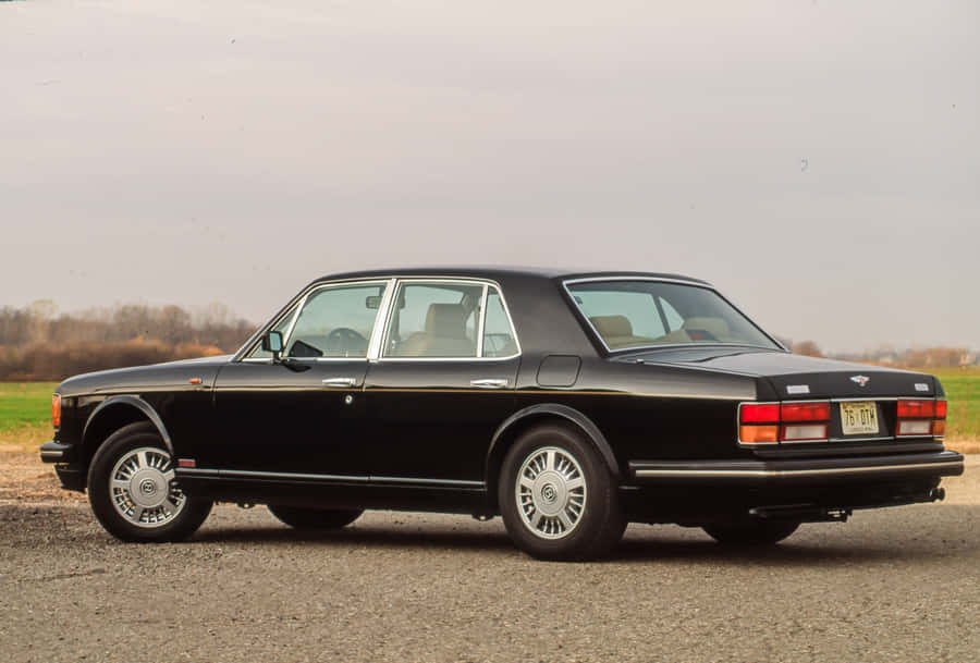 Elegant & Powerful Bentley Turbo R In Action Wallpaper