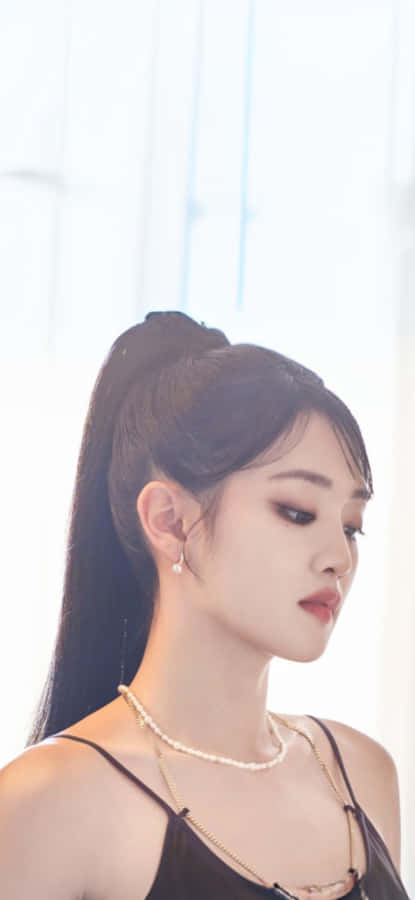 Elegant Profile Pearl Necklace Wallpaper