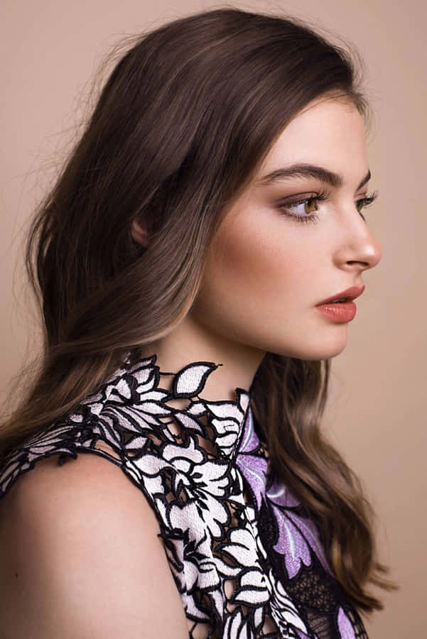 Elegant Profile Portrait Woman Floral Dress Wallpaper