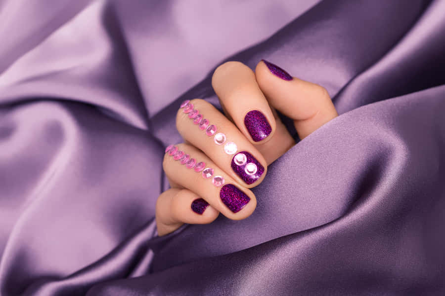 Elegant Purple Glitter Nail Art Wallpaper