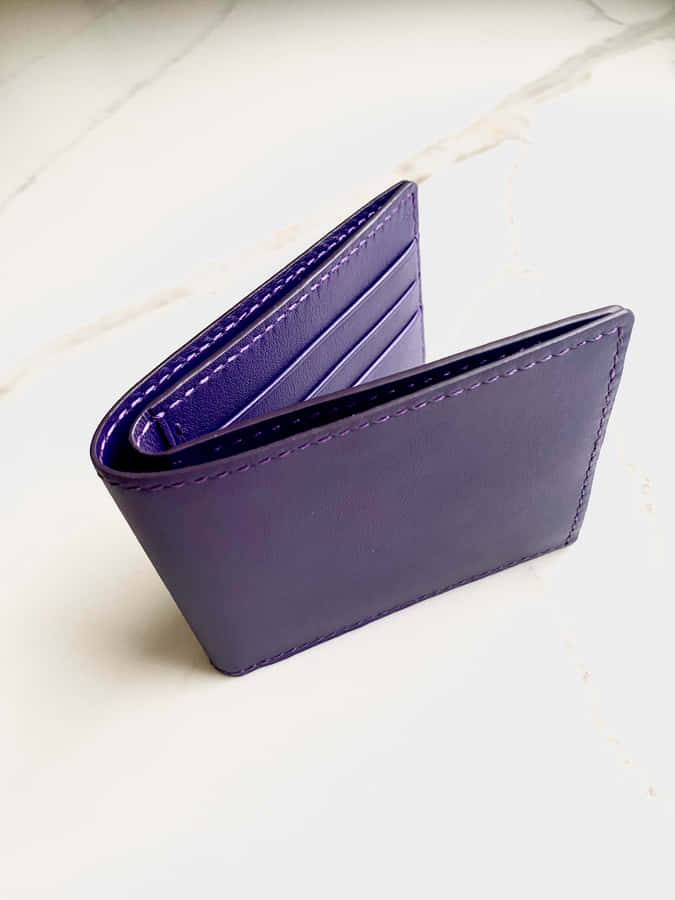 Elegant Purple Leather Wallet Wallpaper