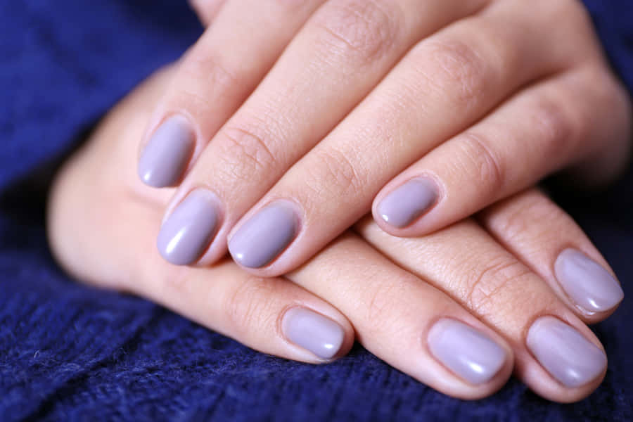 Elegant Purple Manicureon Hands Wallpaper