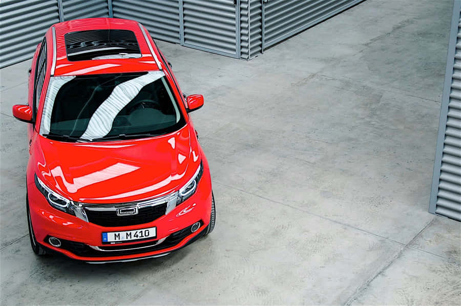 Elegant Qoros 5 Suv On An Open Road Wallpaper