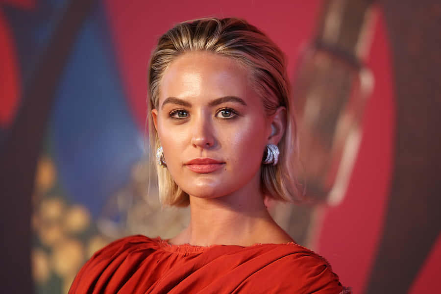 Elegant Red Dress Event Wallpaper