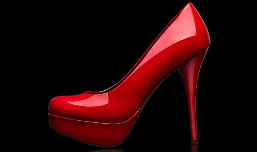 Elegant Red High Heels On A Dark Background Wallpaper