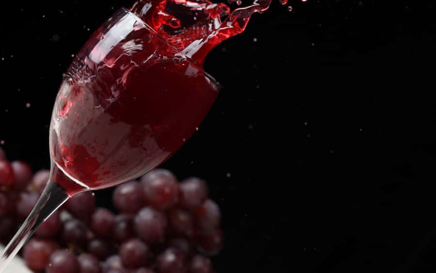 Elegant Red Wine Glass Wallpaper