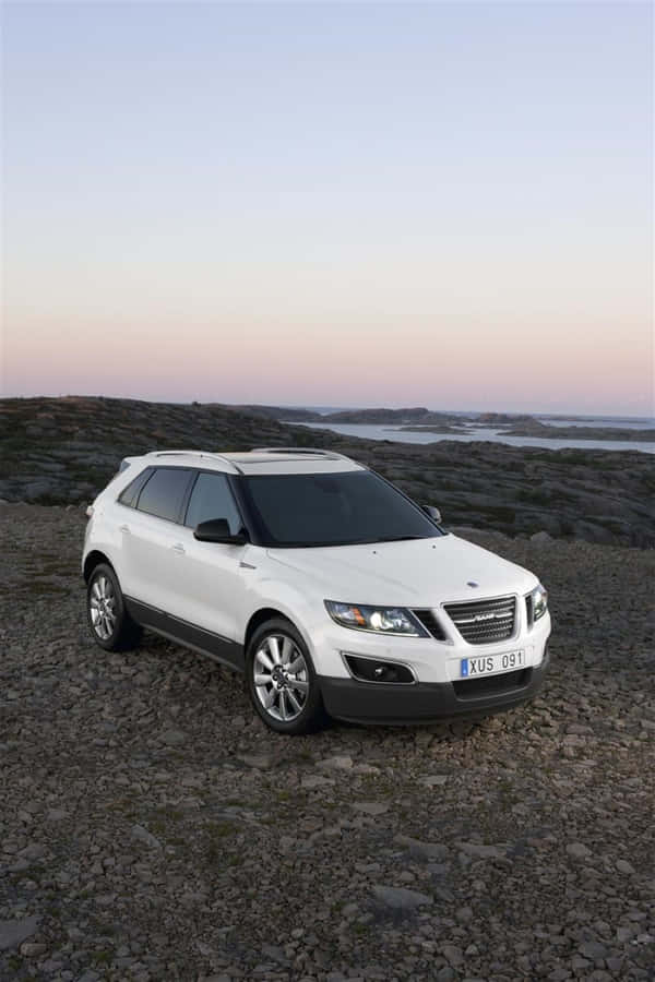 Elegant Saab 9-4x On An Open Road Wallpaper