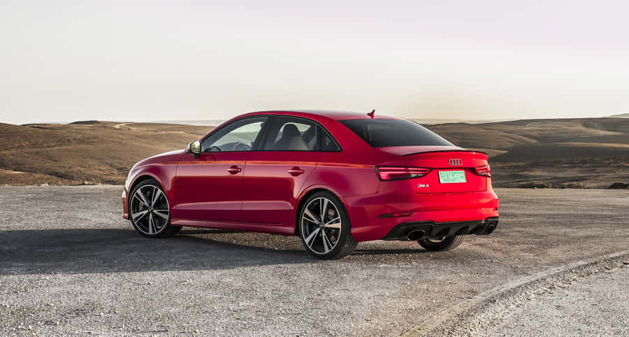 Elegant Sedan In Motion Wallpaper