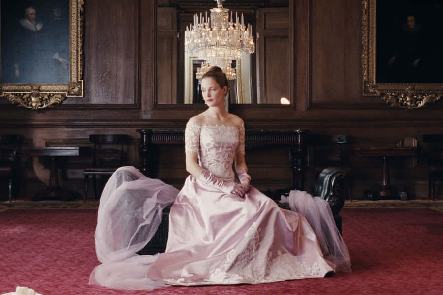 Elegant Womanin Historical Dress Phantom Thread Wallpaper