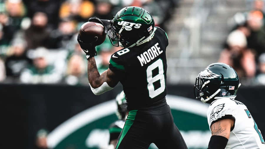 Elijah Moore Catching Football New York Jets Wallpaper