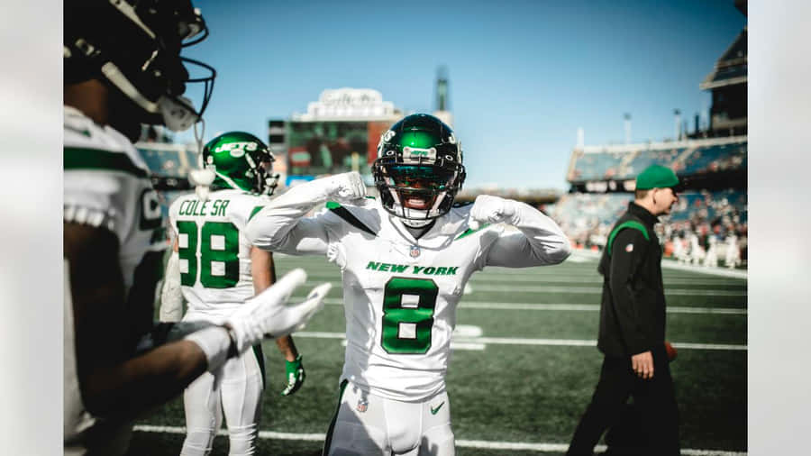 Elijah Moore New York Football Player Pre Game Flex Wallpaper