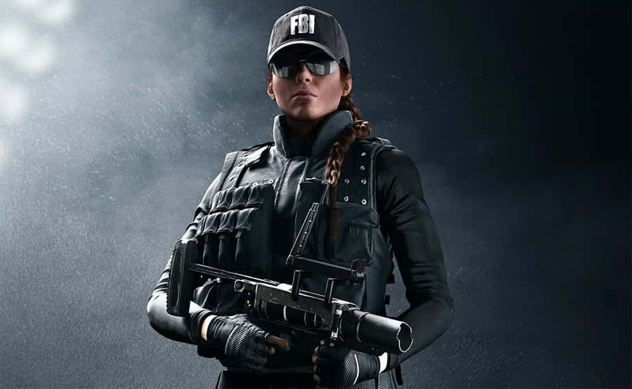 Elite Ash Operator In Action In Rainbow Six Siege Wallpaper