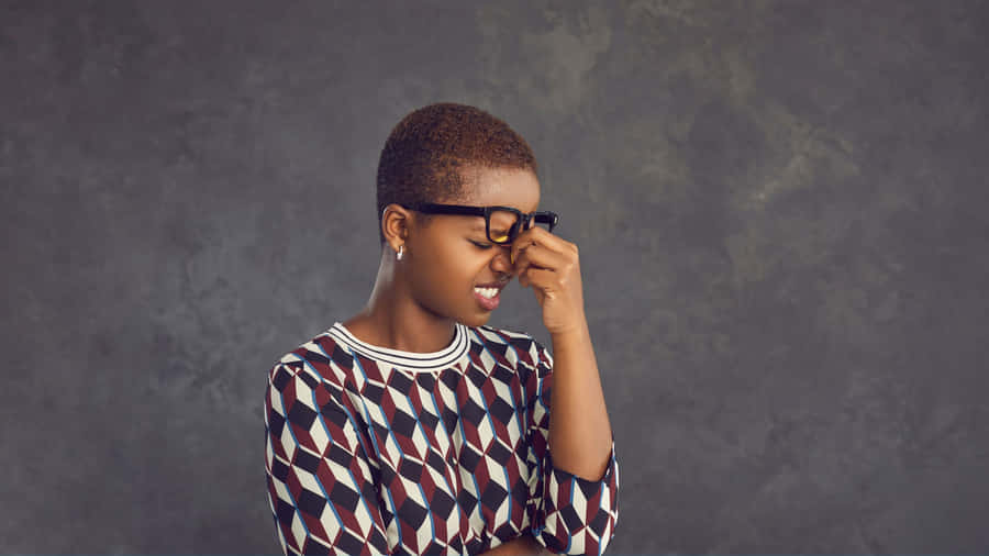 Embarrassed Woman Laughing Wallpaper