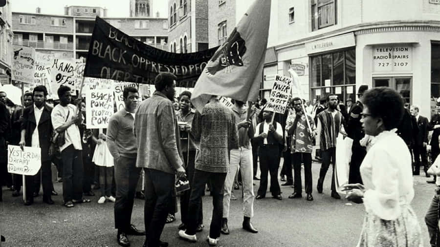 Embodying Strength And Solidarity - Black Power Wallpaper Wallpaper