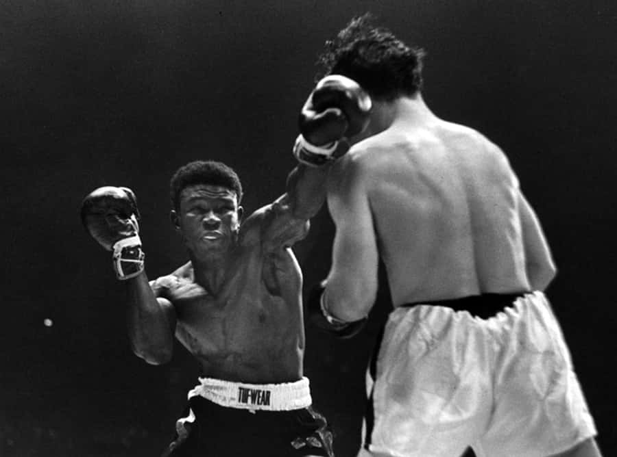 Emile Griffith In Action During Griffith Vs. Paret Boxing Match Wallpaper
