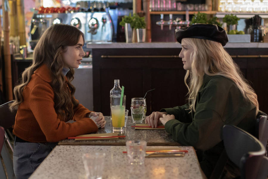 Emily And Camille Share A Special Moment In Paris Over Lunch Wallpaper