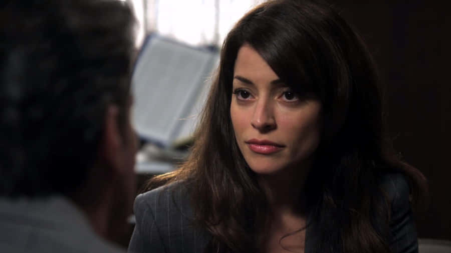 Emmanuelle Vaugier Posing Gracefully In An Outdoor Setting Wallpaper