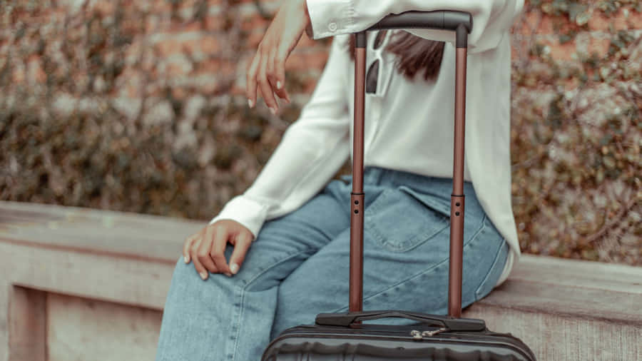 Enchanting Alpine Village With Scenic Mountain Views Wallpaper