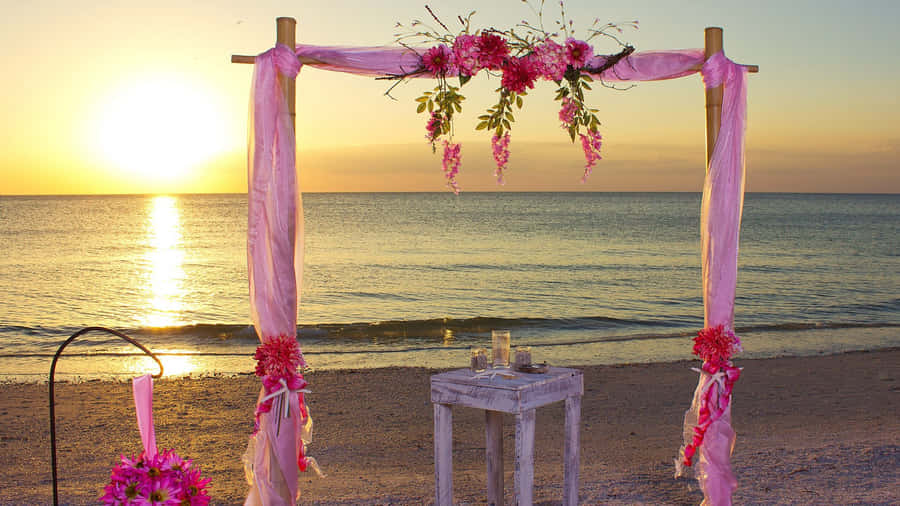 Enchanting Beach Wedding Moment Wallpaper