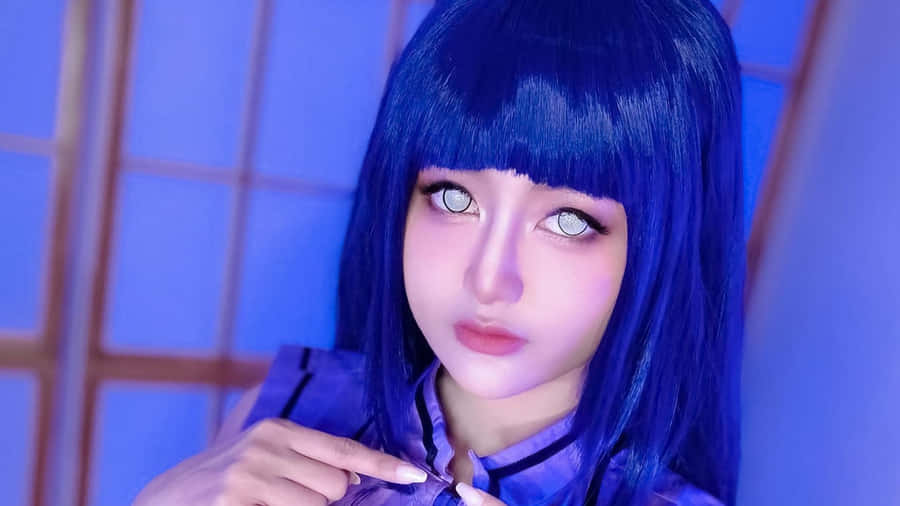 Enchanting Cosplayer Dressed As A Kawaii Anime Character Wallpaper